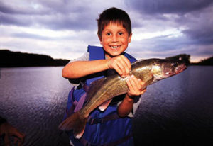 Boy happy he caught fish
