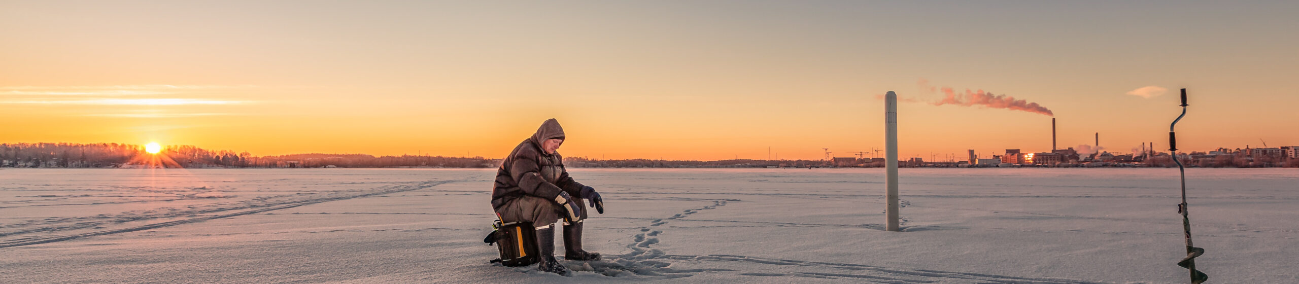 Man Ice Fishing