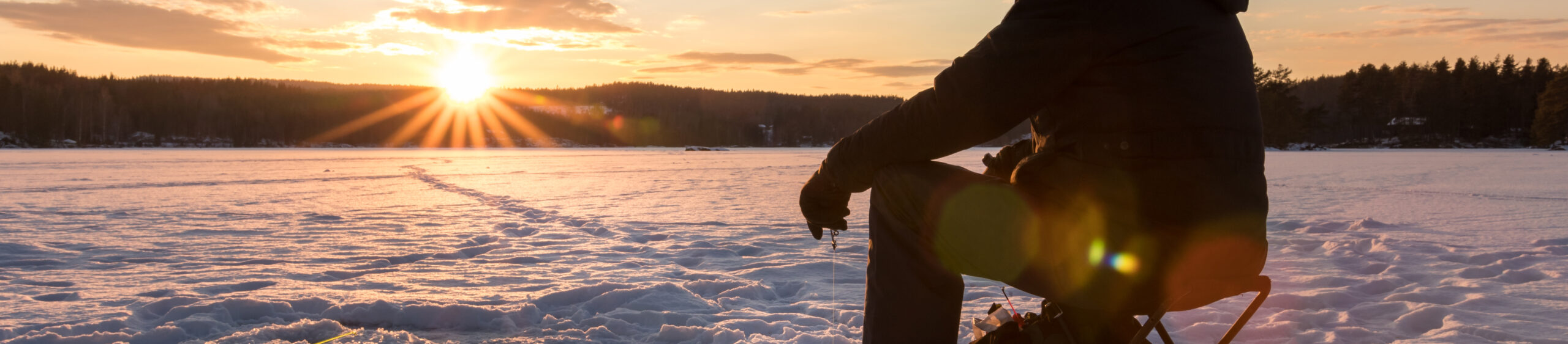 Ice Fishing On Lake