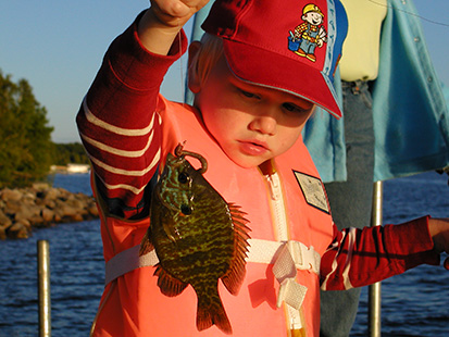 Girl holding fish