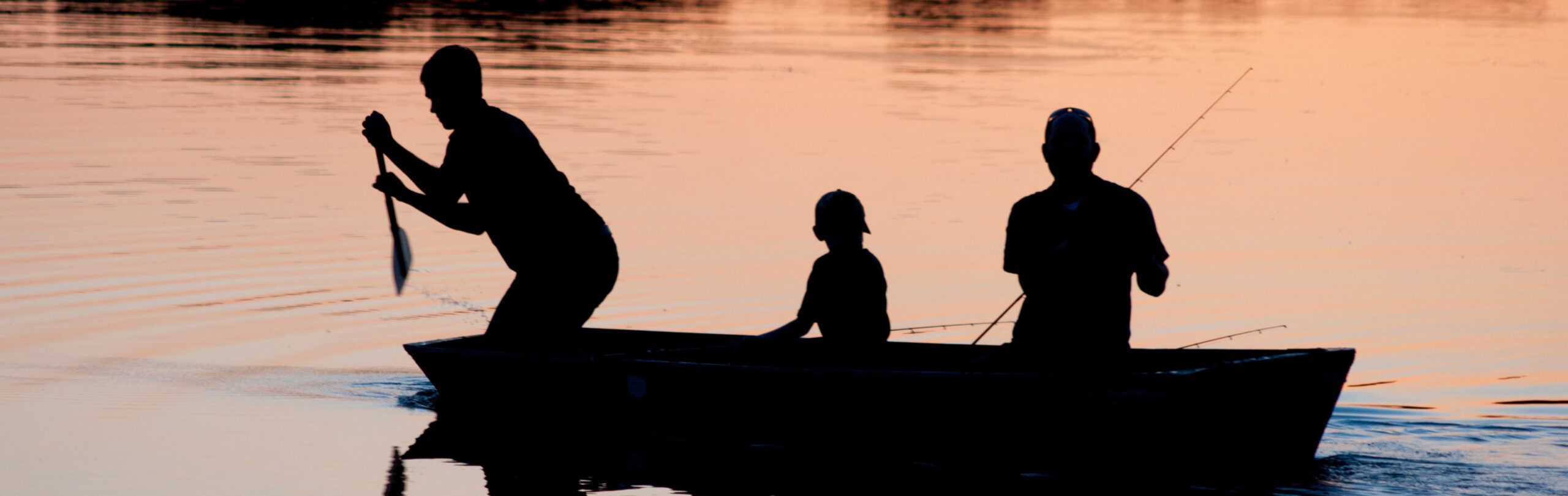 Family Fishing at dawn or dusk