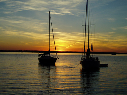 Sailboats at sunset