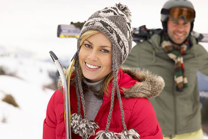 Winter recreation skiier smiling
