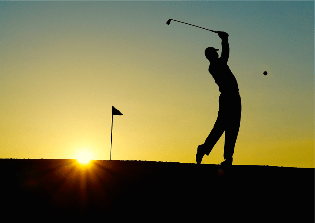 Leech Lake MN golfer back lit