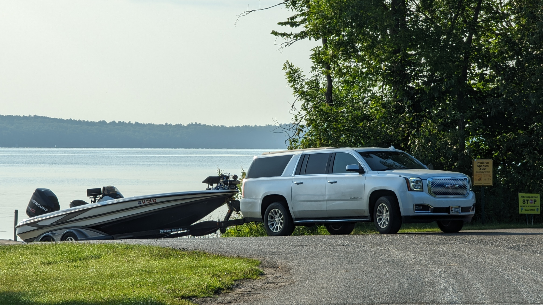 Vehicle pulling boat from the water on Leech Lake